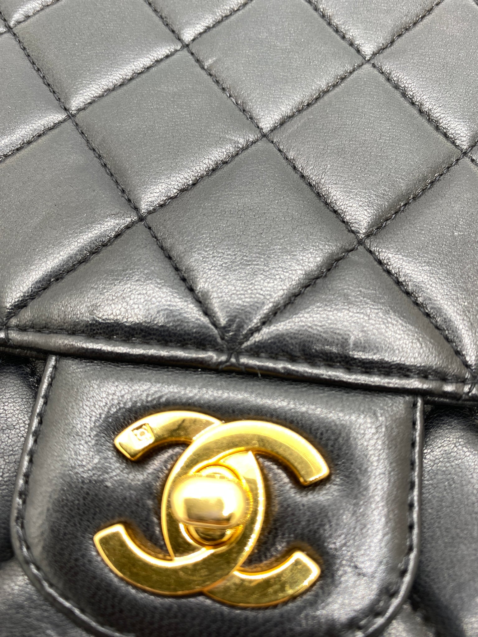 Chanel Quilted Half Flap Bag