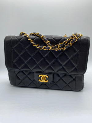 Chanel Quilted Half Flap Bag