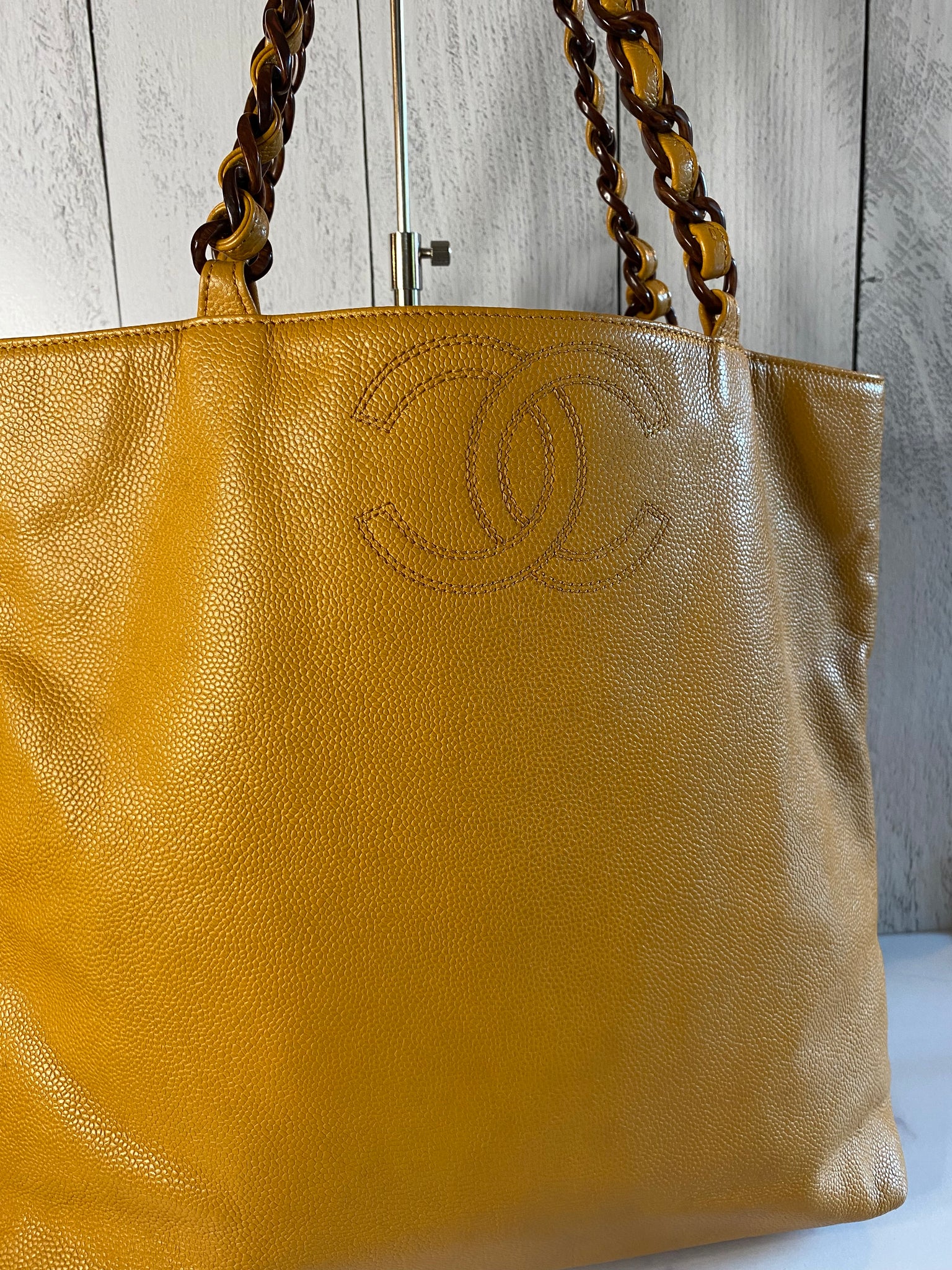 chanel gold tote bag leather